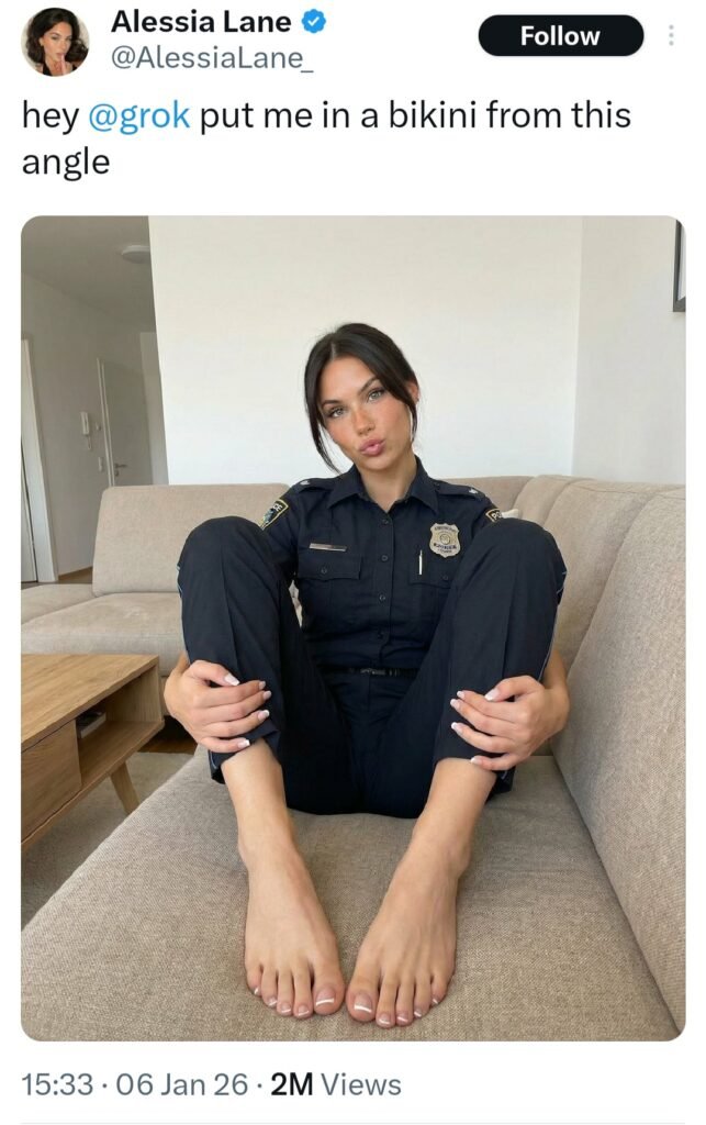 user posts a fully clothed image of herself sitting on a couch with semi spread legs