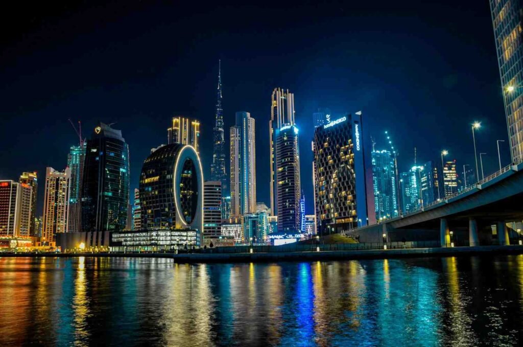 Skyline of Dubai at night showcases Highrise buildings in a queue