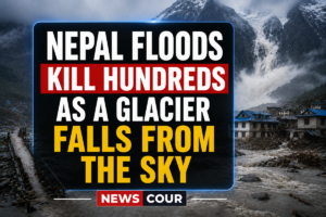 Nepal floods aftermath shown by thick mud and debris covering destroyed homes in a river valley