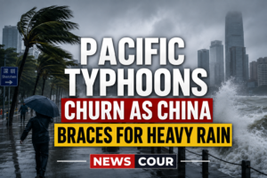 Pacific typhoons shown by a satellite view of multiple storm systems over the western Pacific Ocean