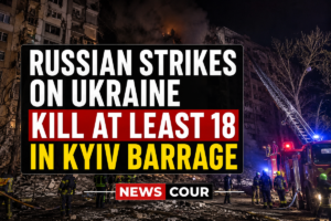 Russian strikes on Ukraine shown by rescuers working on a damaged residential building after shelling