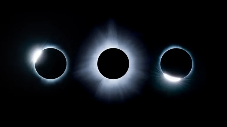 Total solar eclipse showing the sun's white corona around a darkened moon