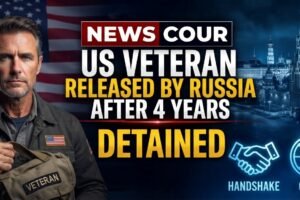 US veteran released home represented by an American flag against a clear sky