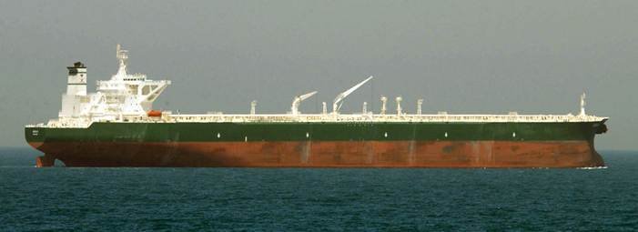 Strait of Hormuz attack context illustrated by a large crude oil supertanker underway at sea